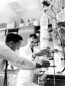 Ed Lightfoot (left) and Victor P. Goldbach run an experiment in the laboratory, Nov., 1968